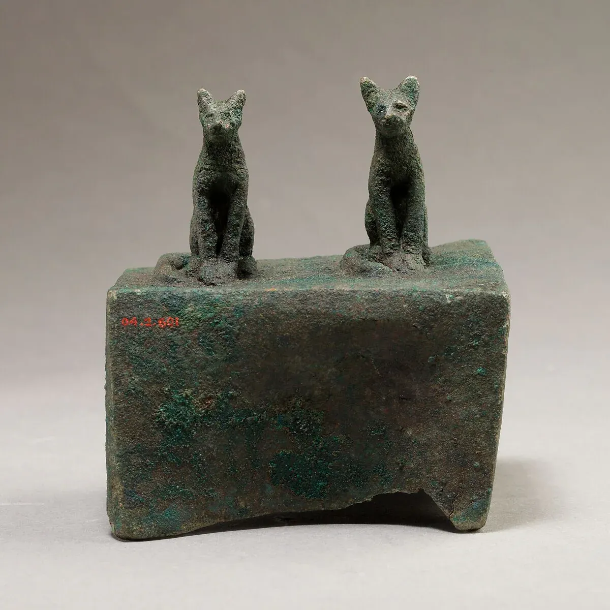 Egyptian metal animal-mummy box topped by two cat figures